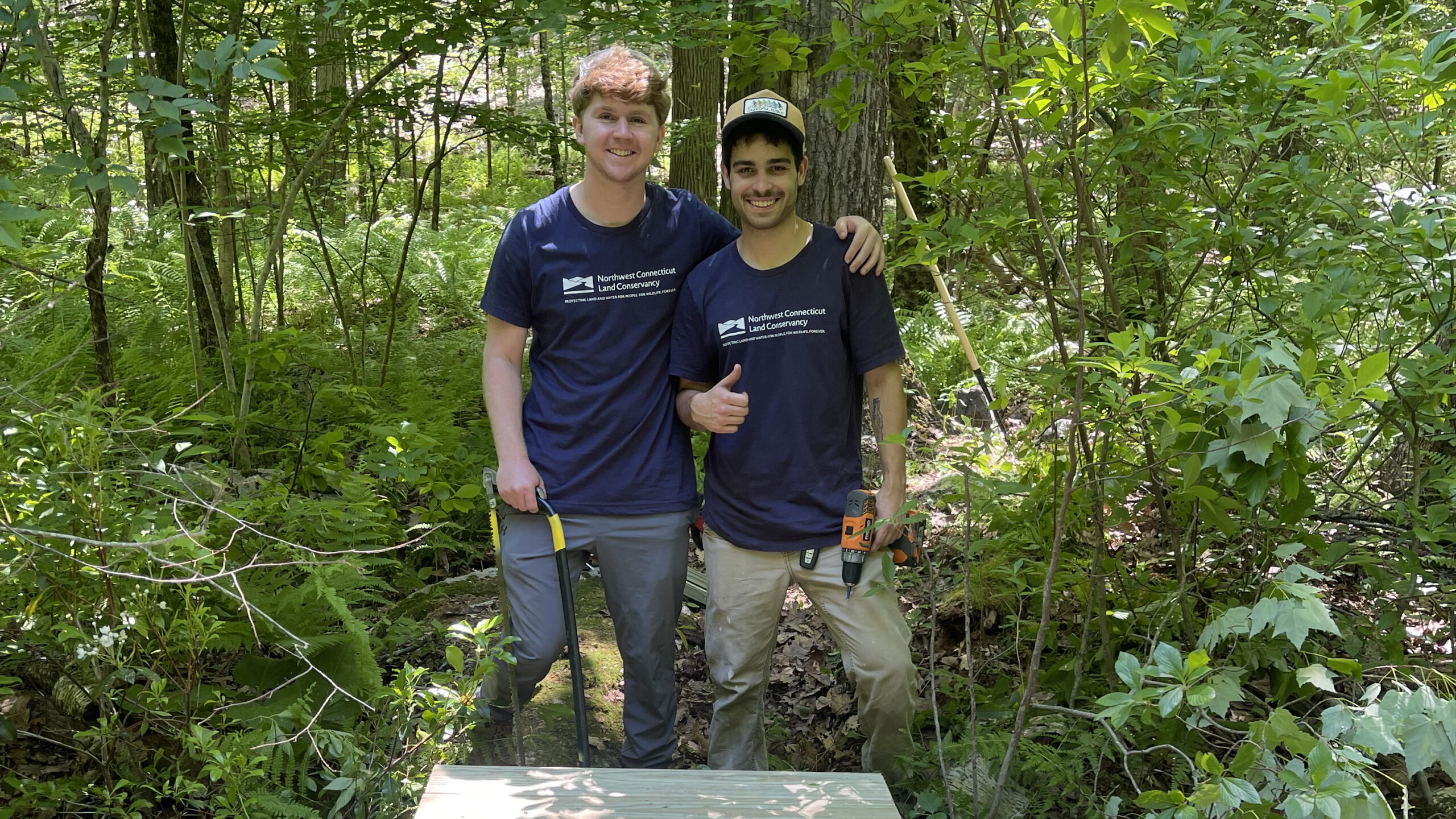 Will Pollitt and Aidan Weik building new footbridge